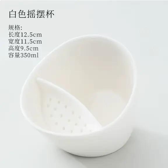 Tasse à thé en porcelaine de 350 ml - Tasse à thé noire et blanche avec infuseur, design inclinable 