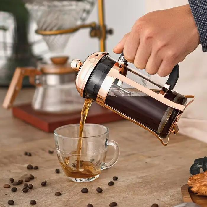 Cafetière française à pression en or rose