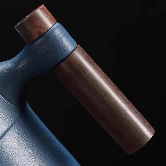 Tasse en céramique noire avec poignée en bois, compartiment pour thé, filtre intégré, design classique et européen, idéale pour bureau ou cadeau d'anniversaire