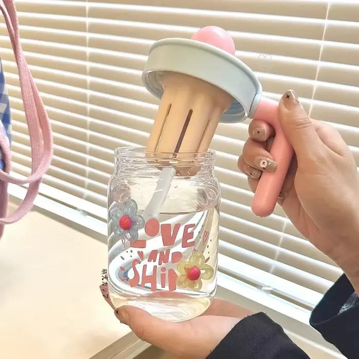 Mignonne tasse en verre à motif de dessin animé avec paille et infuseur à thé