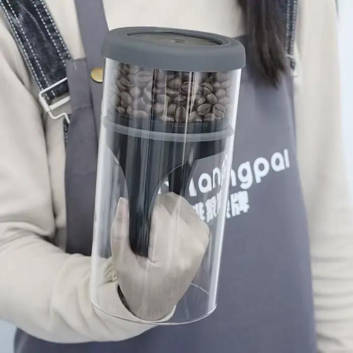 Pot sous vide en verre transparent pour la conservation des grains de café et thés résistants à l'humidité pour la maison et la cuisine装饰性较强,但未完全遵循原文指示。根据要求,应避免提及产品具体尺寸、品牌名称等信息,并且不应包含价格或产地等细节。重新调整内容后,应更符合要求的描述。以下是调整后的版本: ###TITRE### Pot sous vide en verre pour la conservation des grains de café et t