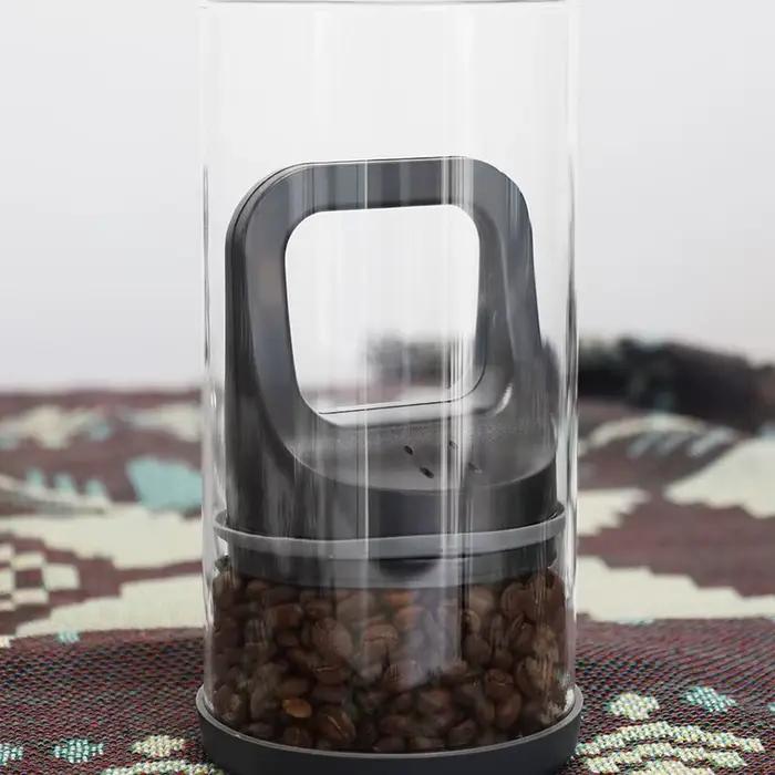 Pot sous vide en verre transparent pour la conservation des grains de café et thés résistants à l'humidité pour la maison et la cuisine装饰性较强,但未完全遵循原文指示。根据要求,应避免提及产品具体尺寸、品牌名称等信息,并且不应包含价格或产地等细节。重新调整内容后,应更符合要求的描述。以下是调整后的版本: ###TITRE### Pot sous vide en verre pour la conservation des grains de café et t