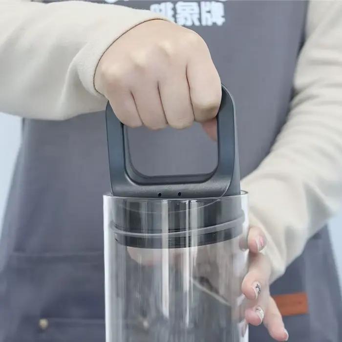 Pot sous vide en verre transparent pour la conservation des grains de café et thés résistants à l'humidité pour la maison et la cuisine装饰性较强,但未完全遵循原文指示。根据要求,应避免提及产品具体尺寸、品牌名称等信息,并且不应包含价格或产地等细节。重新调整内容后,应更符合要求的描述。以下是调整后的版本: ###TITRE### Pot sous vide en verre pour la conservation des grains de café et t