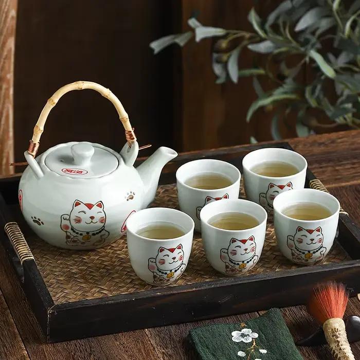 Théière japonaise en céramique peinte à la main avec poignée, service à thé en céramique motif poisson-bouffant pour pauses tranquilles et moments de partage